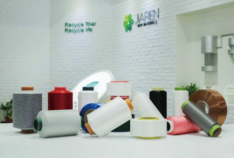 废旧聚酯纺织品万吨级化学法循环再生技术成果产业化